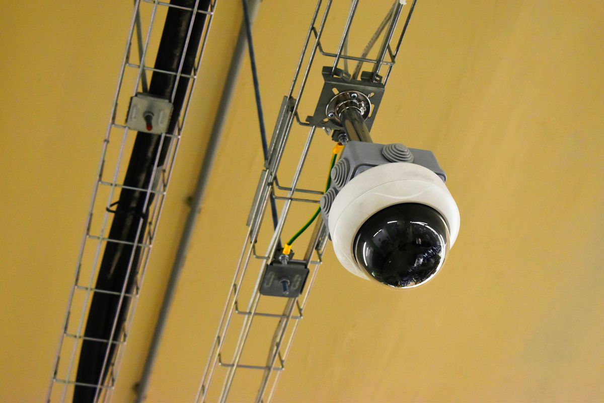 Dome security camera mounted to ceiling