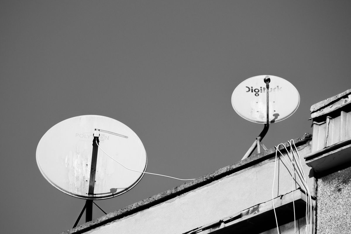 Satellite dishes mounted on a rooftop